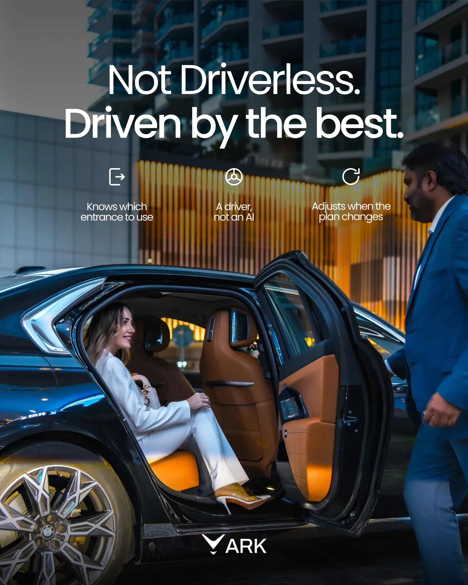 ARK gönderisi: “Not driverless. Driven by the best.”, açık arka kapıdan inen beyaz takımlı kadın